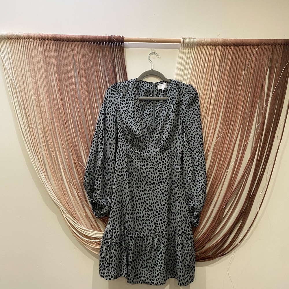 Green dress with black polka dots